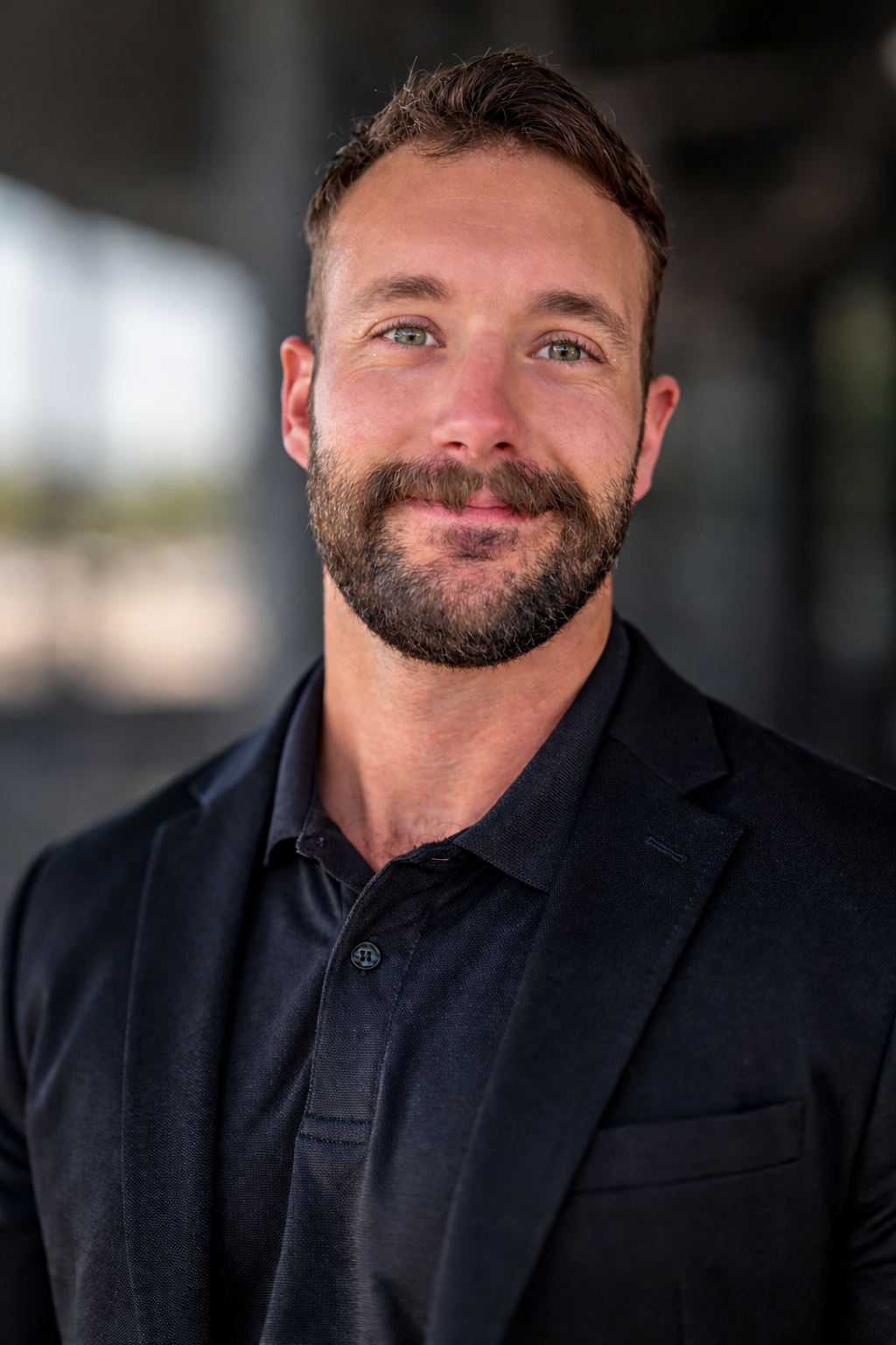 Portrait of Evan Watz, co-founder of Full Circle Media Group alongside Jamie Watz